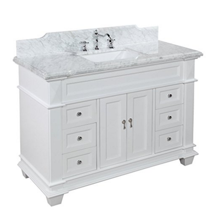 Carrara countertop and backsplash make this furniture-style bath vanity a classic... Soft close drawers.